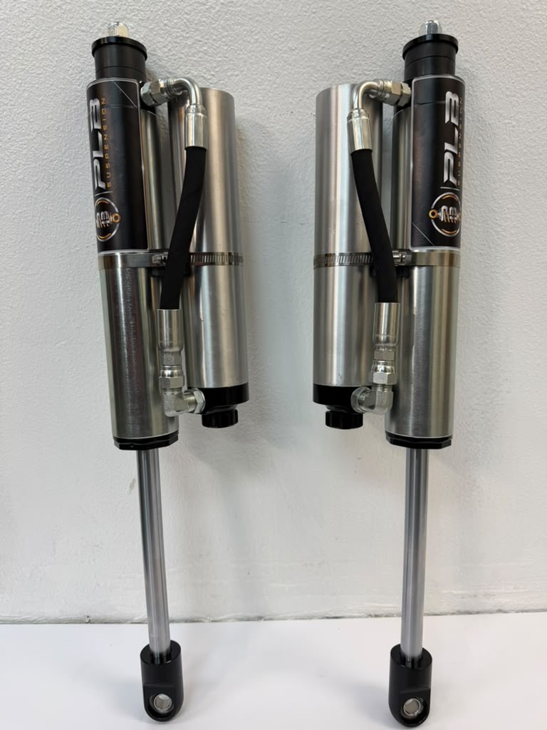 PLB bypass shock pair with reservoirs